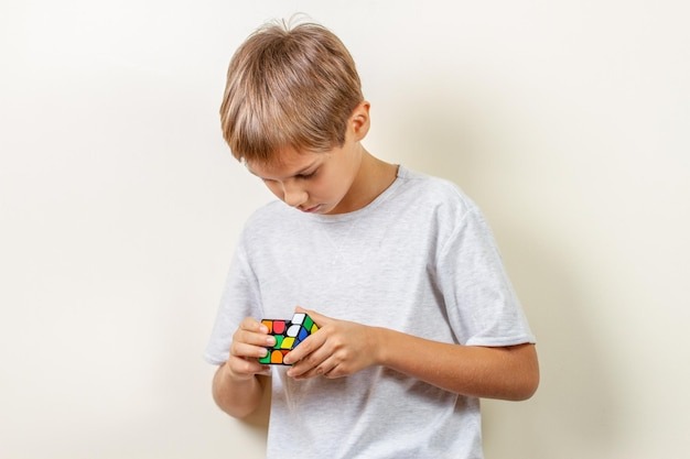 boy-looking-camera-white-backgro