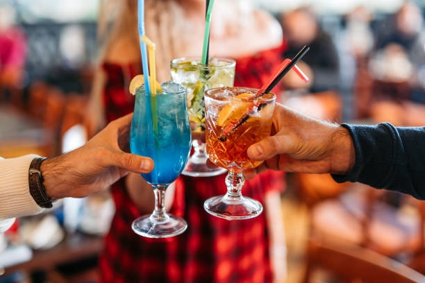 three-young-friends-cheering-wit